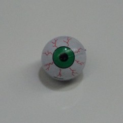 DEMOLITION MAN GREEN EYEBALL